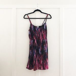 Pink, purple, and black straps dress